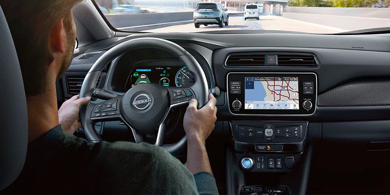 A person driving the 2025 Nissan Leaf